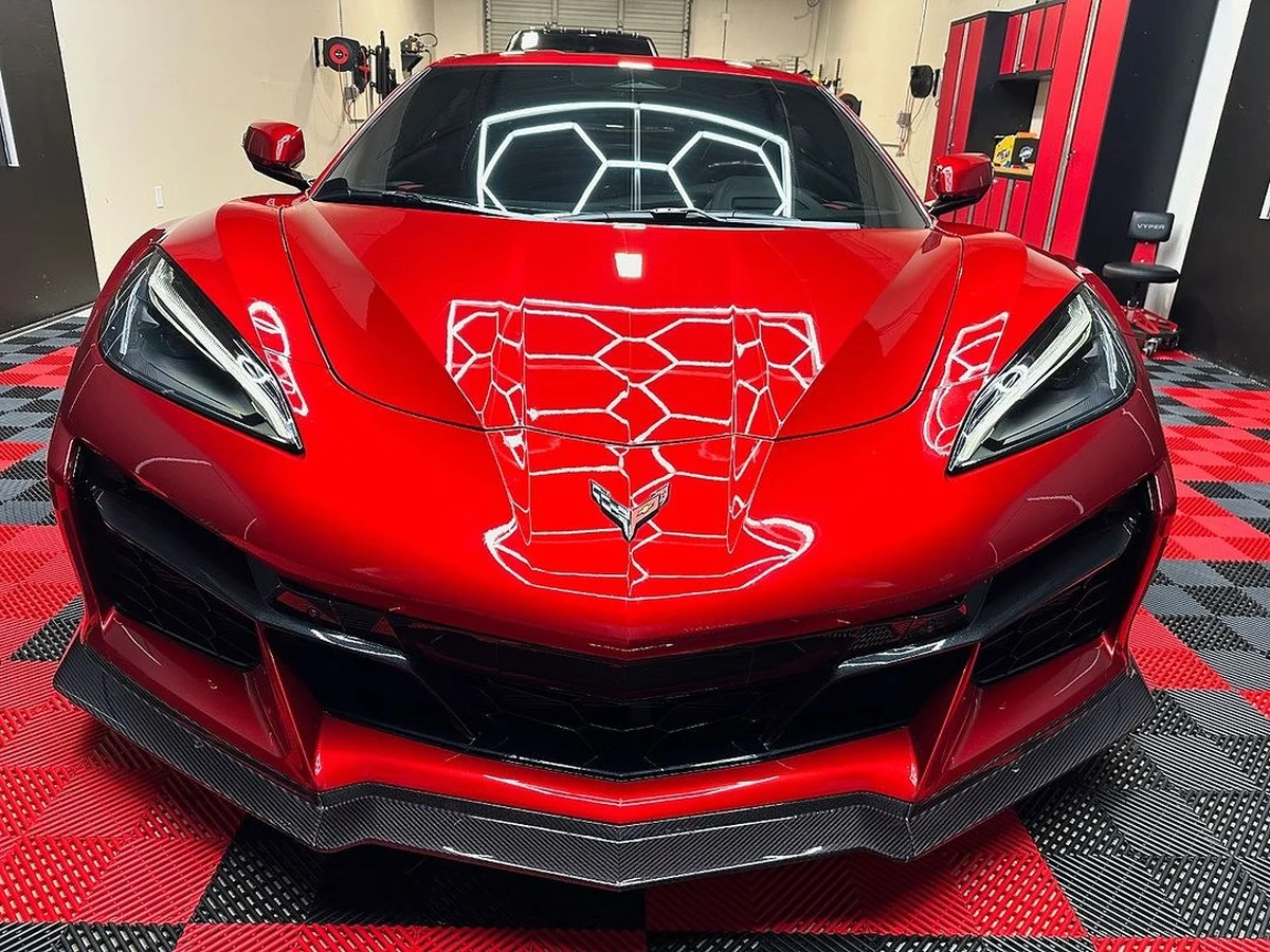 Car with fresh window tint in a San Jose shop bay