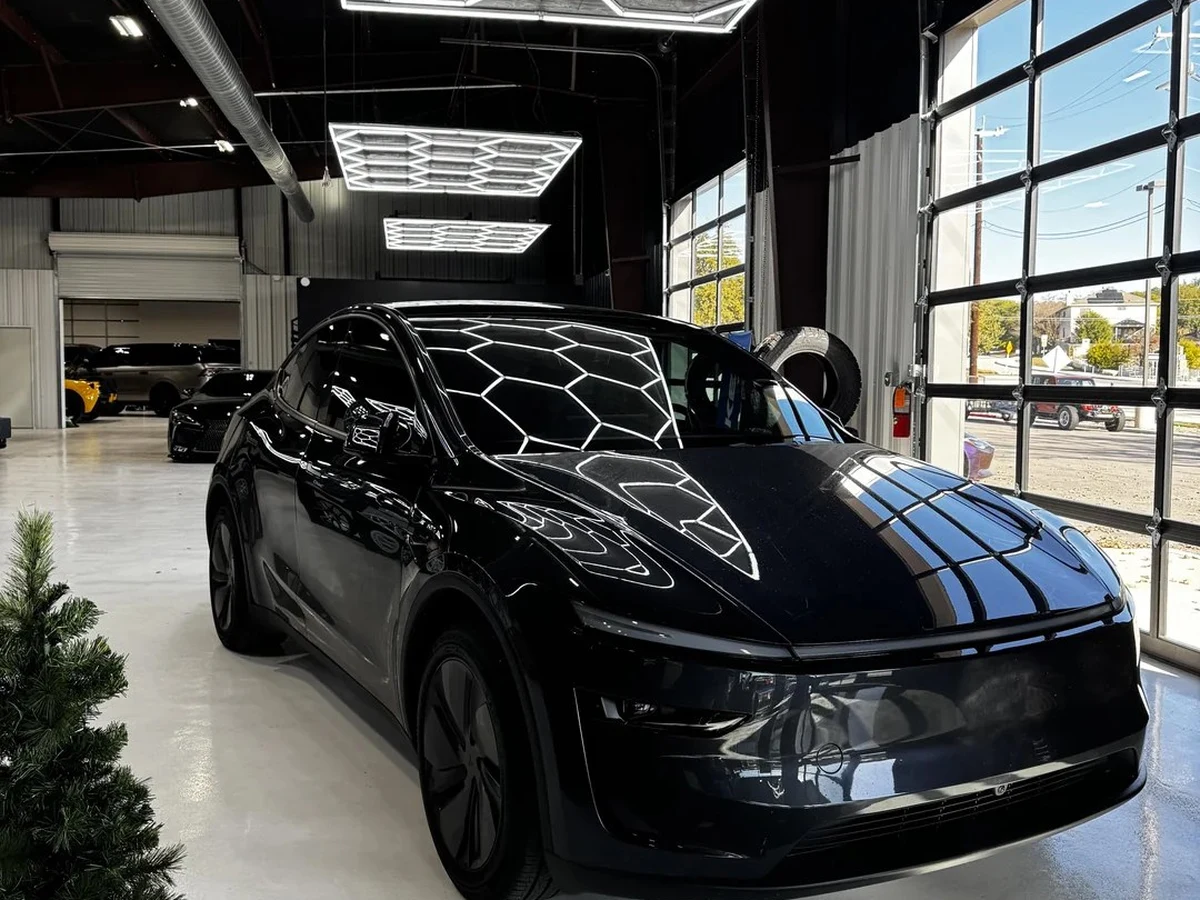A glossy finished car in the TintMyRide install bay in San Jose